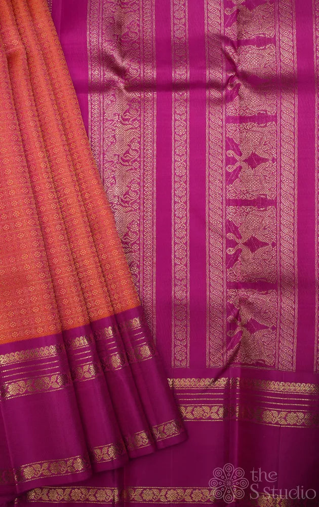 Peachish orange kanjivaram silk saree with ranipink border