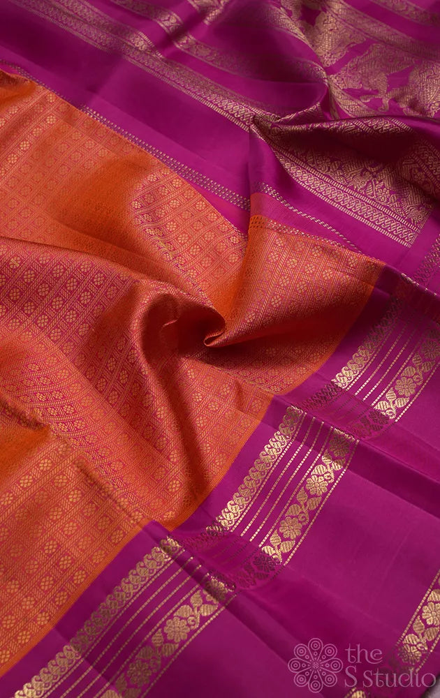 Peachish orange kanjivaram silk saree with ranipink border