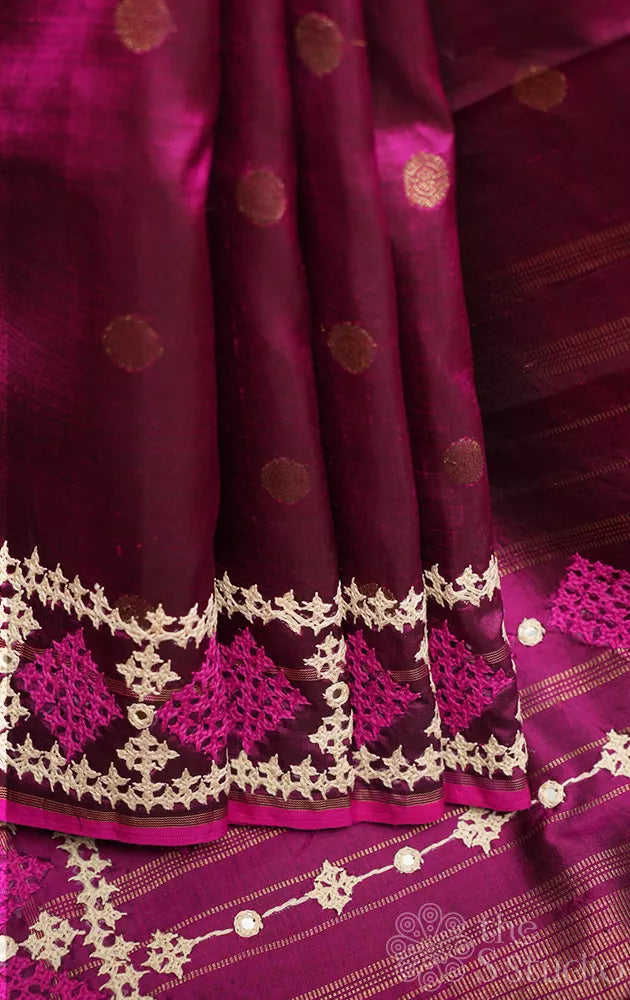 Magenta kanchipuram silk saree with hand kutch embroidered border