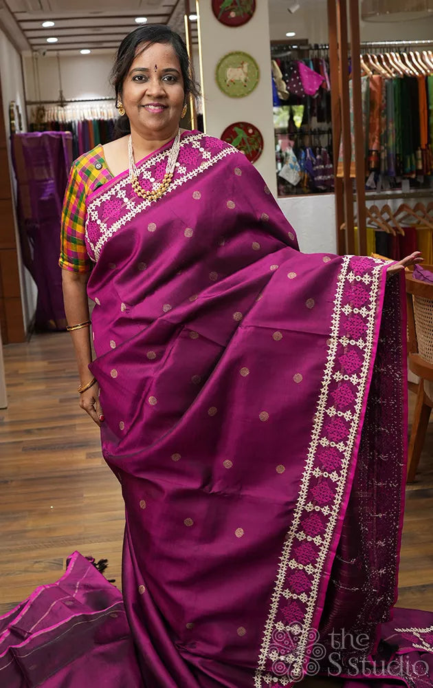 Magenta kanchipuram silk saree with hand kutch embroidered border