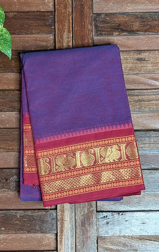 Purple kanchi cotton saree with red zari woven border