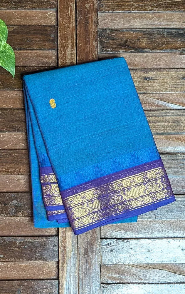 Teal blue kanchi cotton saree with small zari border