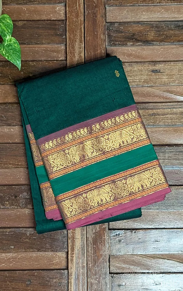 Dark green kanchi cotton saree with rettaipet zari border