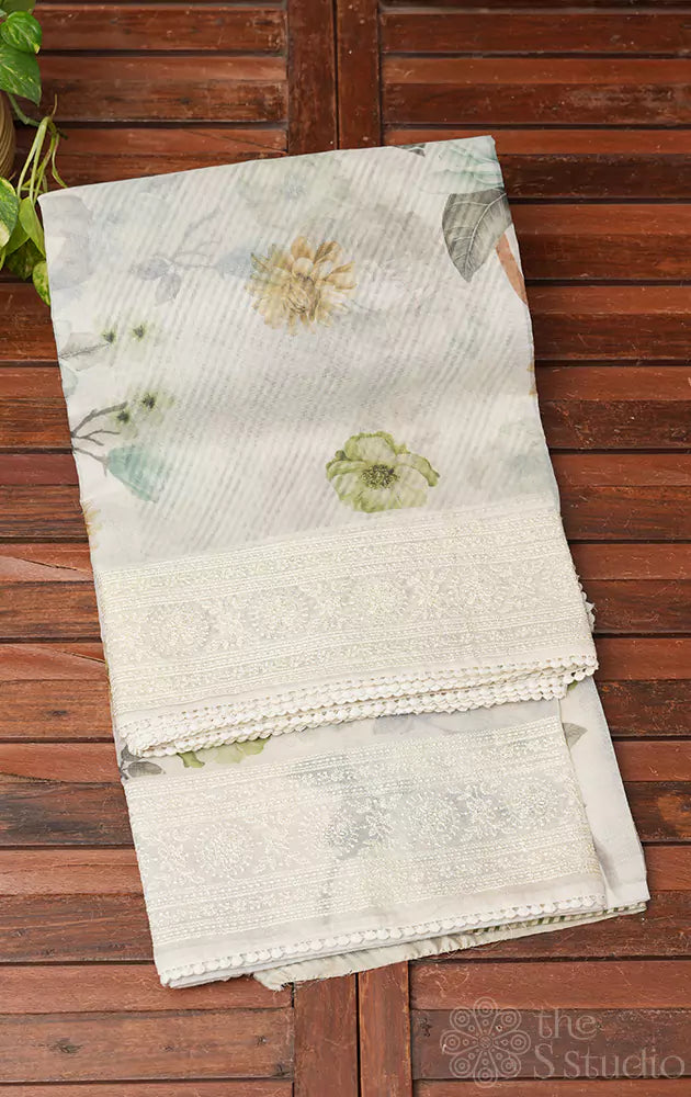 Off-white supernet saree with green floral prints