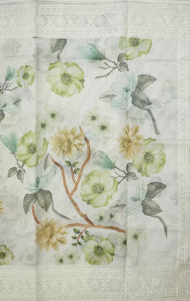 Off-white supernet saree with green floral prints