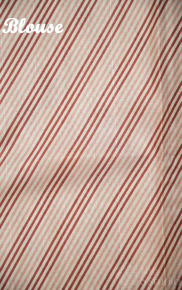 Off-white supernet saree with brown floral prints