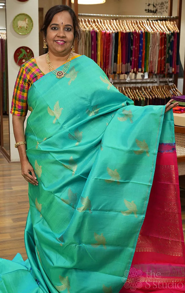 Bluish green colour kanchipuram silk saree with bird motifs