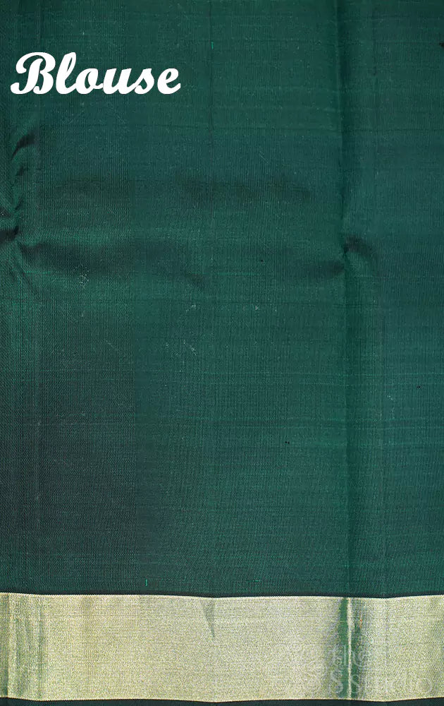 Rama green kanjivaram silk saree with paisely motif
