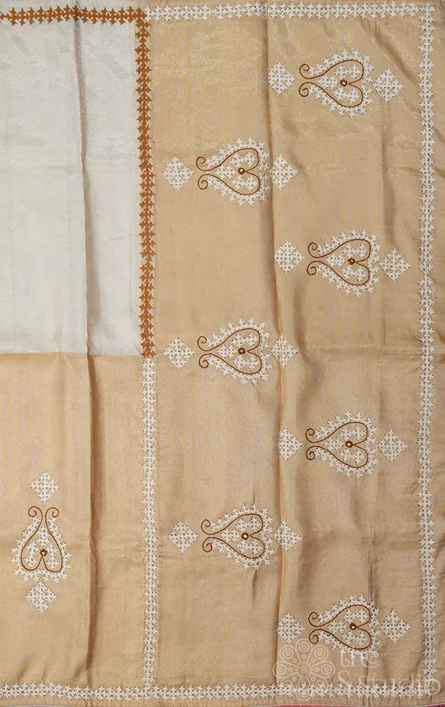 Off white and golden tissue kanchipuram silk saree with kutch embroidery