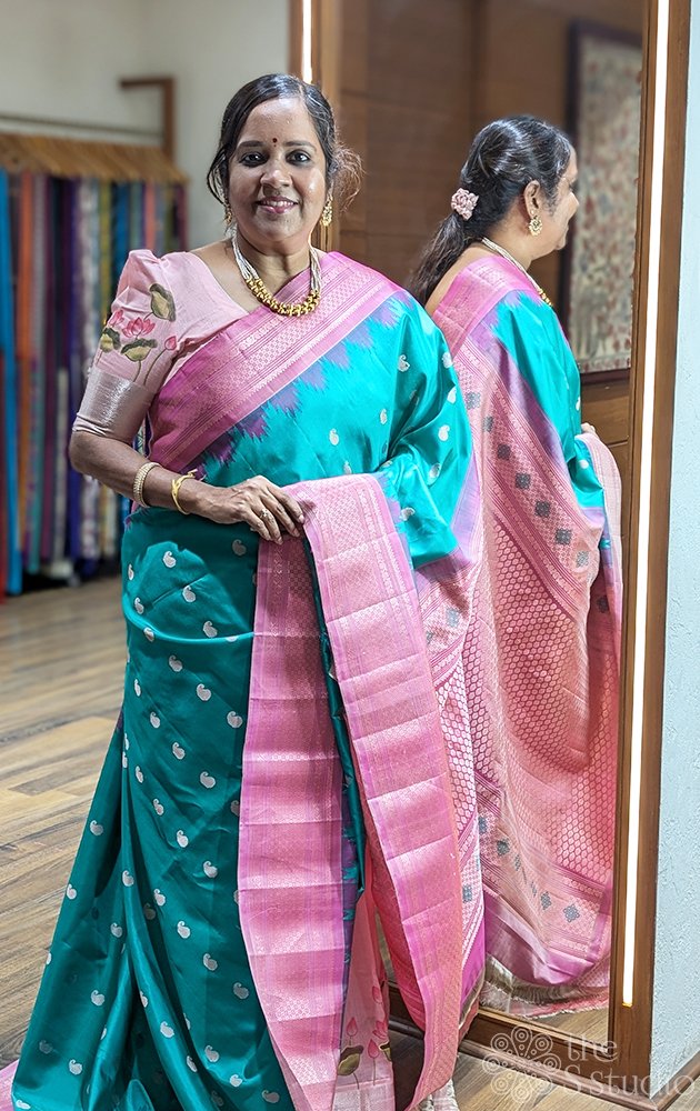 Sea green Gadwal silk saree with pink temple border