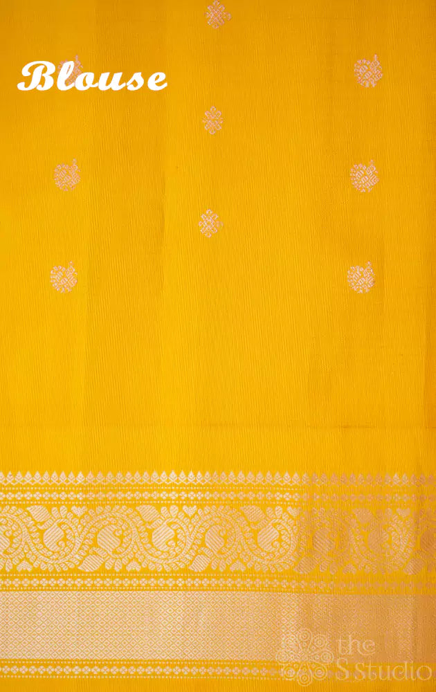 Peachish orange Gadwal silk saree with yellow zari border