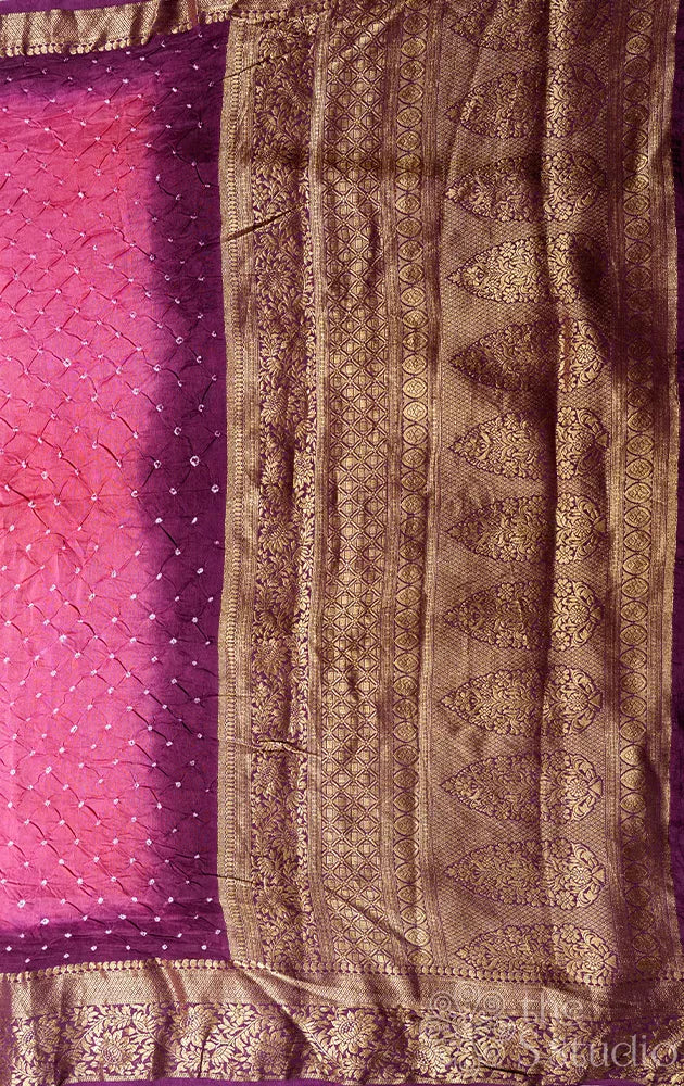Rani pink bandhani semi silk saree with a Purple banarasi border