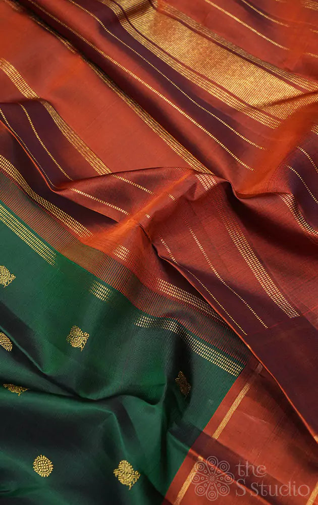 Green kanjivaram silk saree with rust border