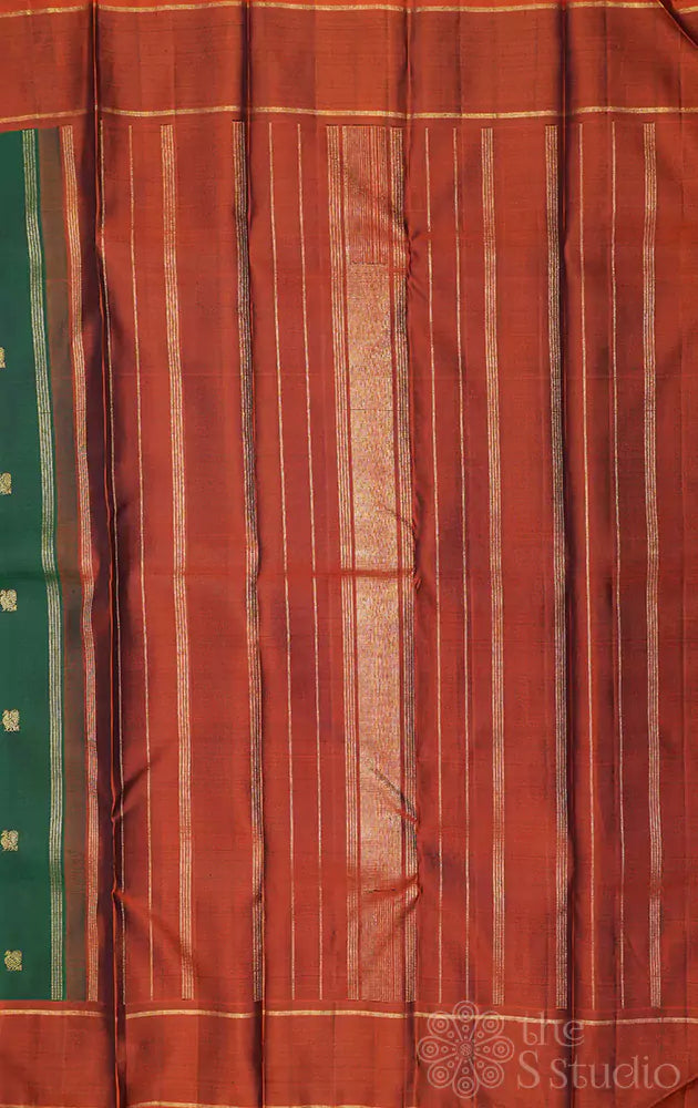 Green kanjivaram silk saree with rust border