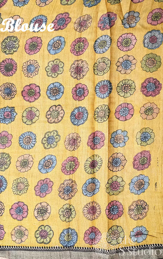 Light orange hand painted kalamkari tussar silk saree with black border