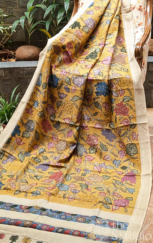 Mustard hand painted kalamkari tussar silk saree with ghicha border