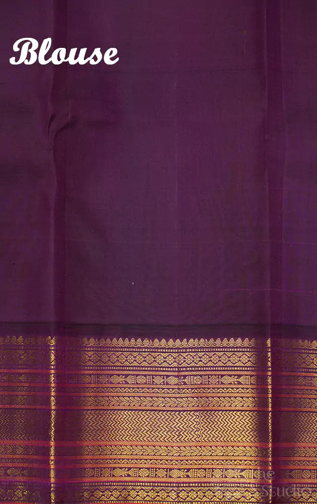 Pista green kanchi pattu saree with korvai purple border