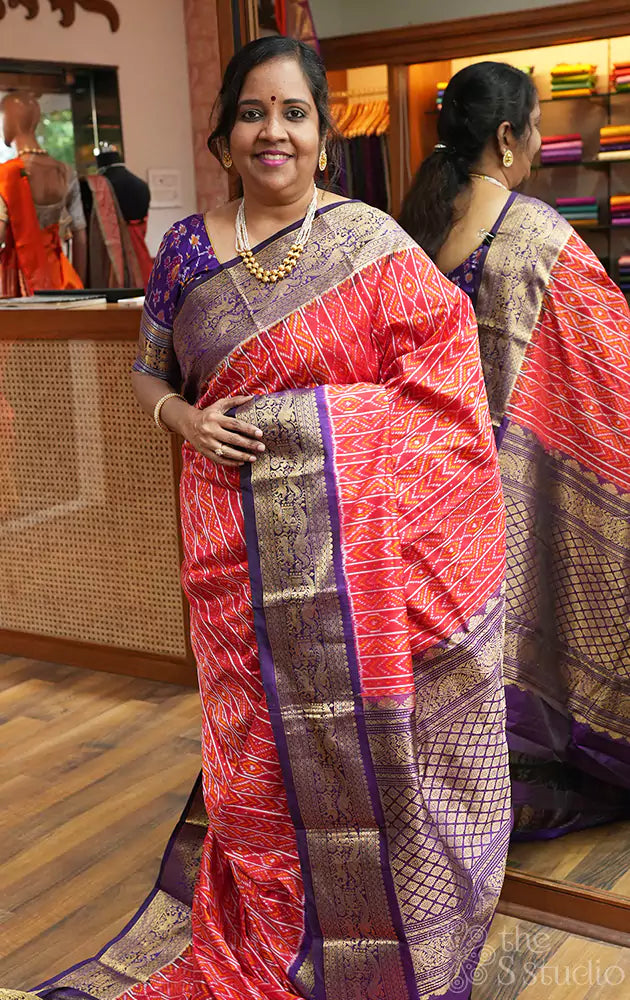 Red ikat silk saree with purple kanchi style zari border