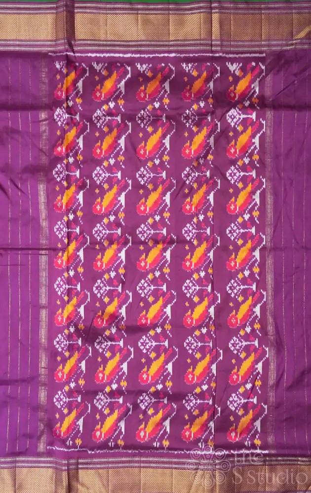 Orange ikkat silk saree with purple border