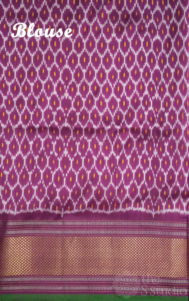 Orange ikkat silk saree with purple border
