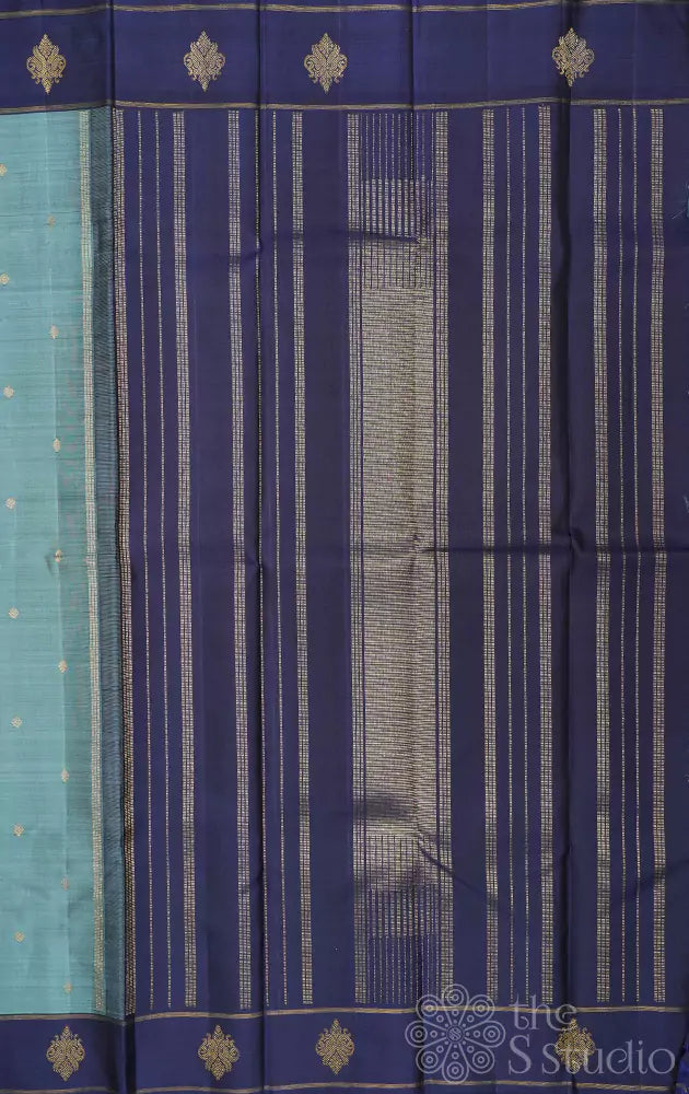 Light blue kanjivaram silk saree with peacock buttas border