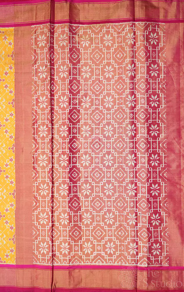 Yellow tissue ikkat silk saree with rani pink border