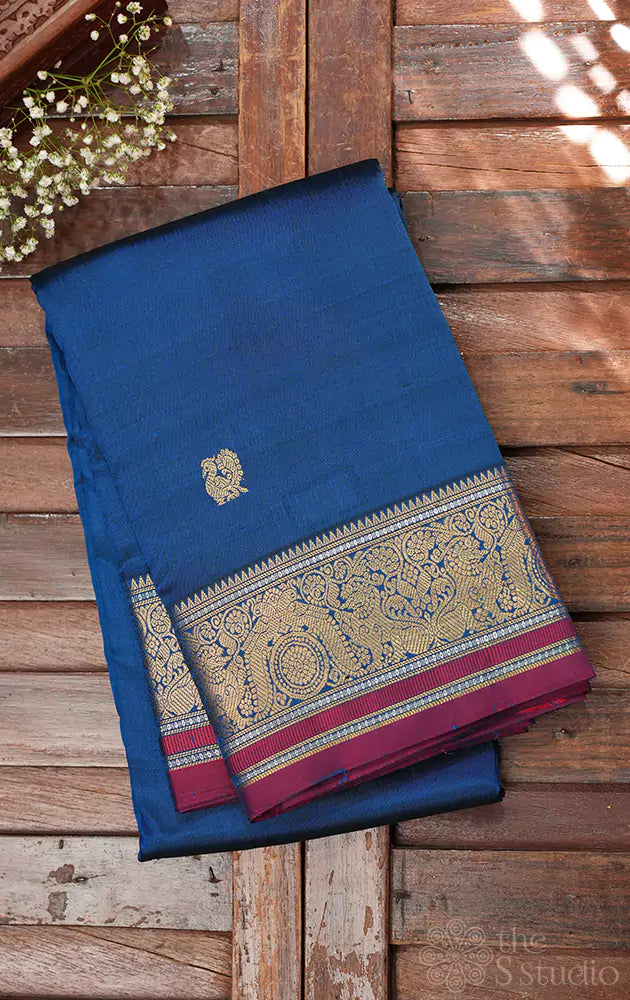 Peacock blue kanchi silk saree with mayil chakaram buttas