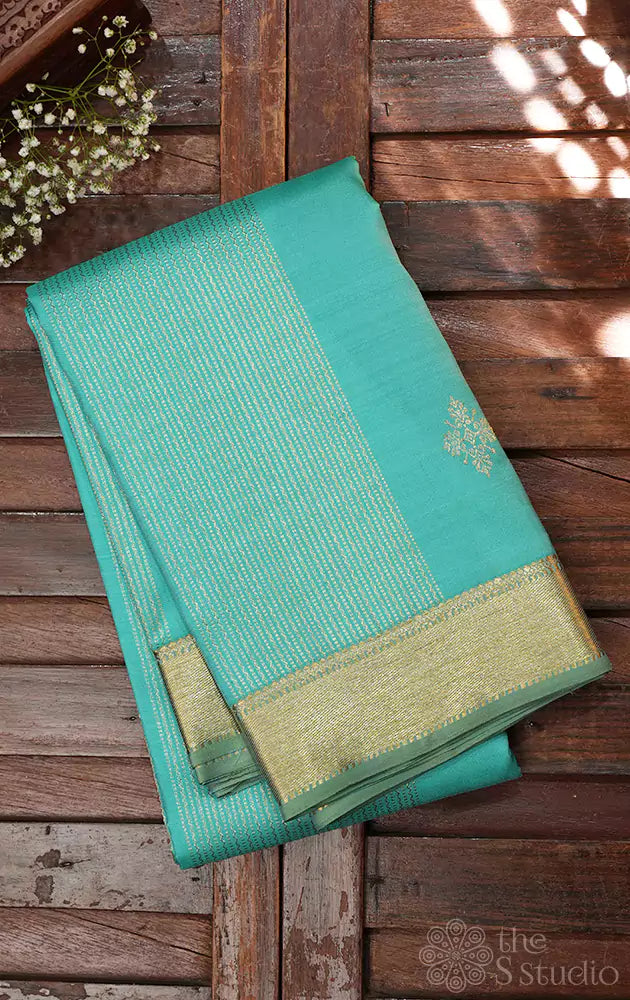Aqua blue kanjivaram saree with small border