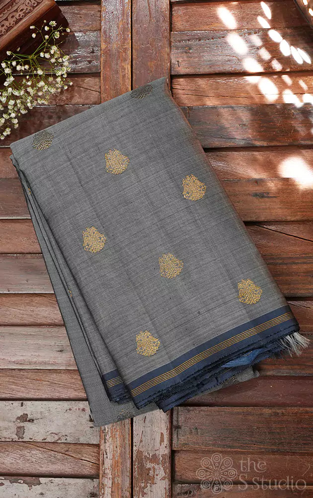 Grey kanchi pattu saree with ganda berunda motifs