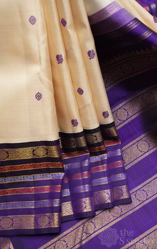Beige kanchipuram silk saree with korvai border