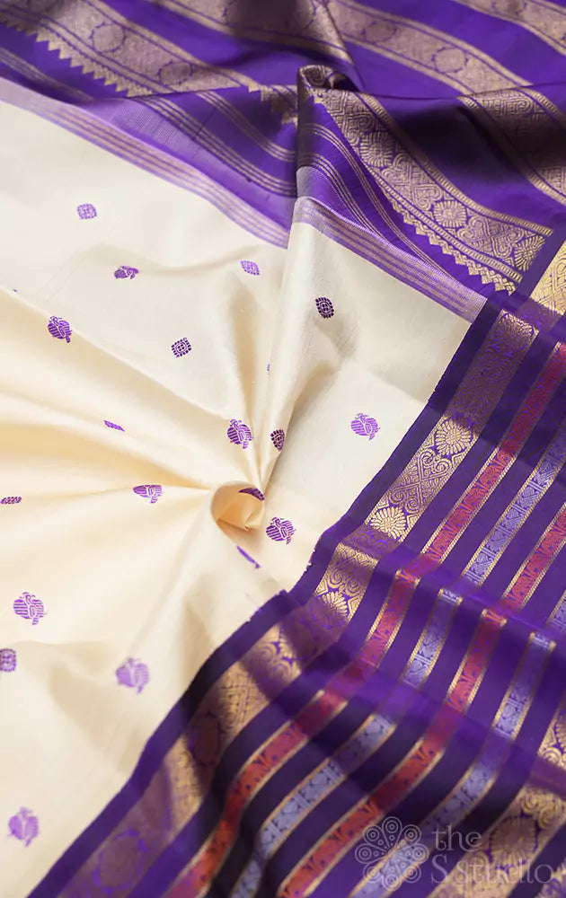 Beige kanchipuram silk saree with korvai border
