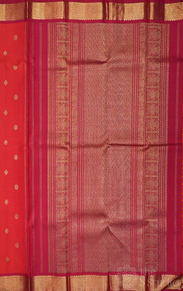 Rust kanchi pattu saree with small maroon border
