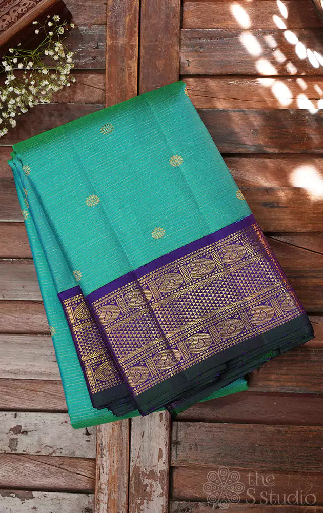 Sea green vairaoosi kanchipuram silk saree with korvai violet border