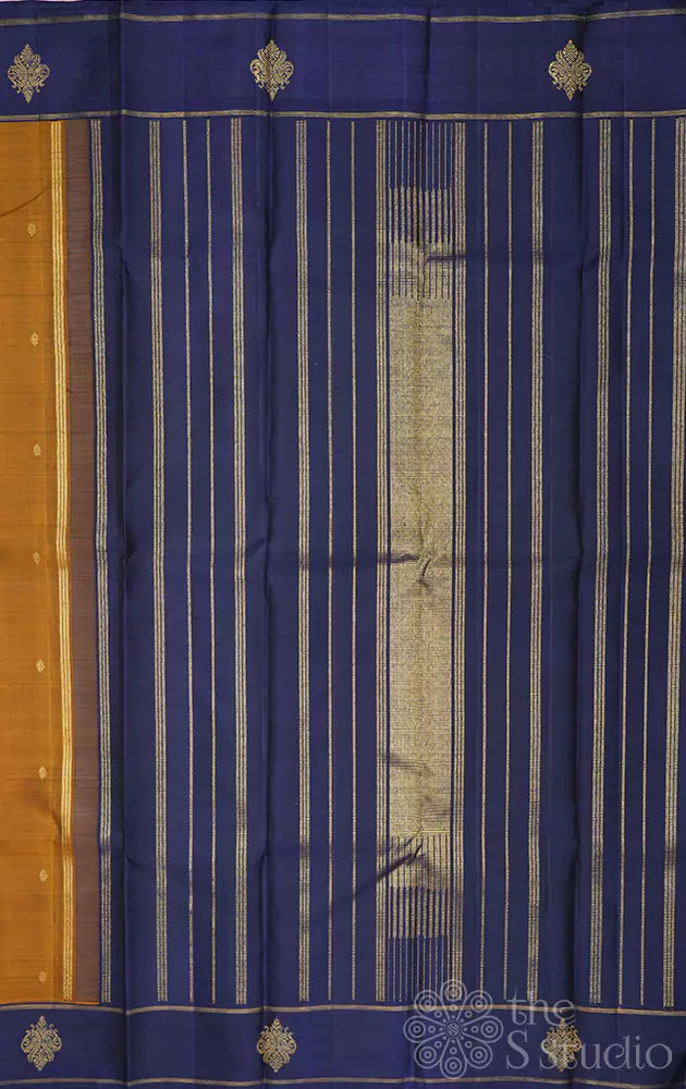 Golden brown kanjivaram silk saree with peacock buttas border