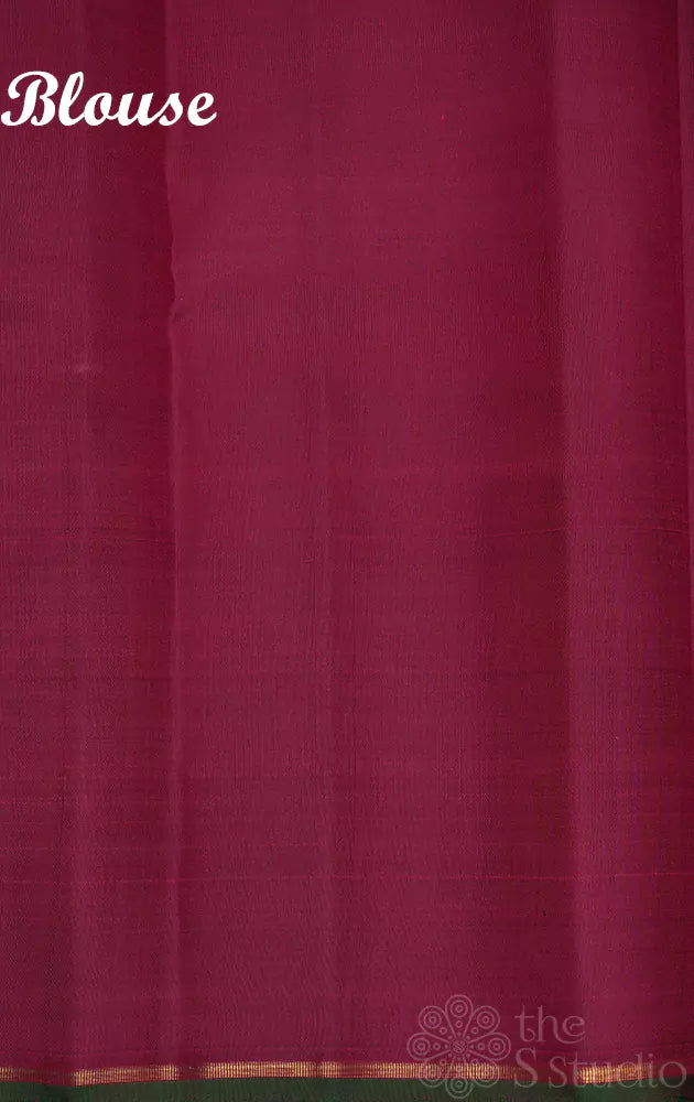 Maroon kanchipuram silk saree with border buttas