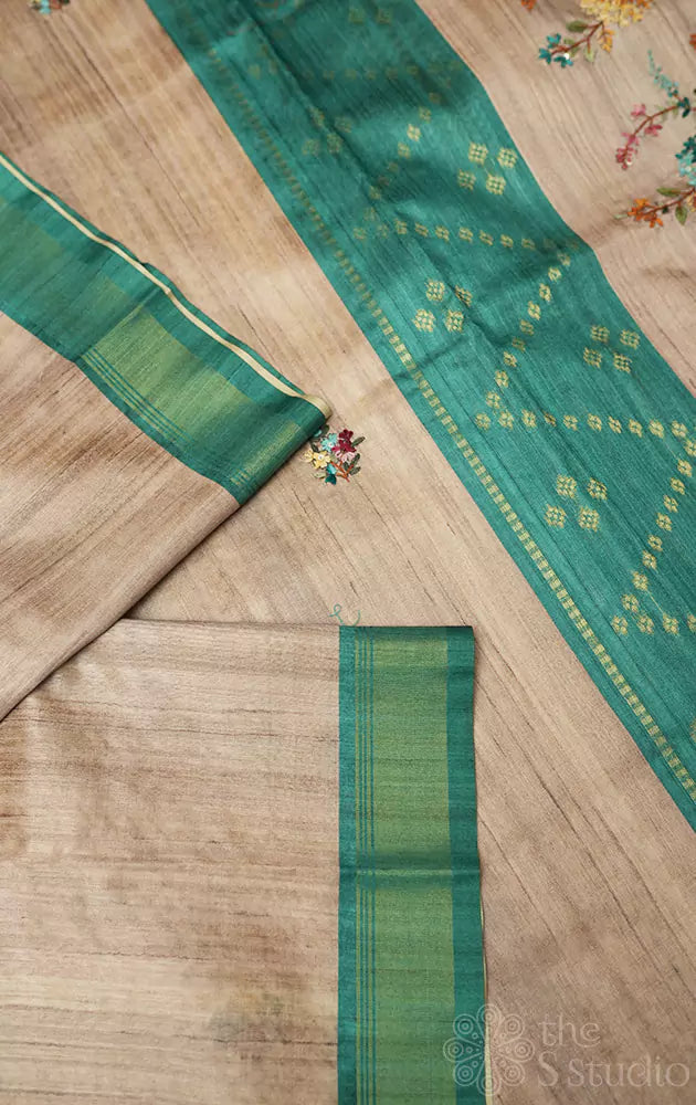 Beige semi tussar saree with floral embroidery