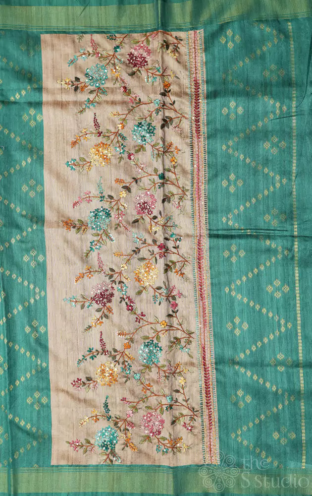 Beige semi tussar saree with floral embroidery