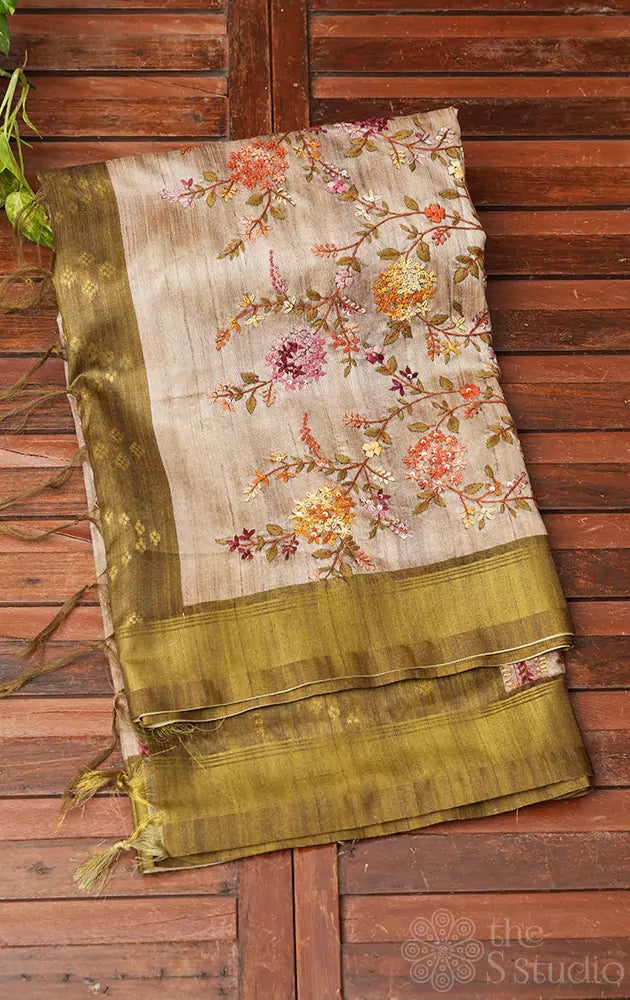 Beige semi tussar saree with light green border