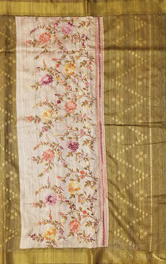 Beige semi tussar saree with light green border