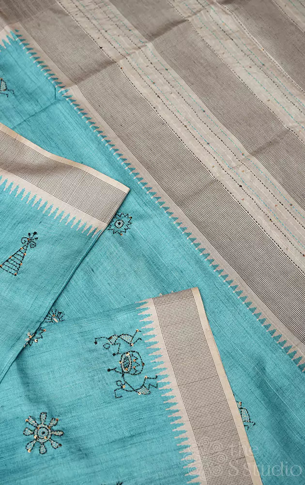 Sea blue semi tussar saree with temple border and embroidery