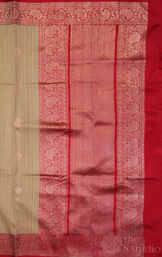Beige handwoven tussar banarasi silk saree with red zari border