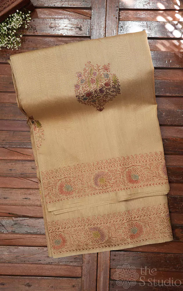 Beige handloom tussar banarasi silk saree with antique zari border