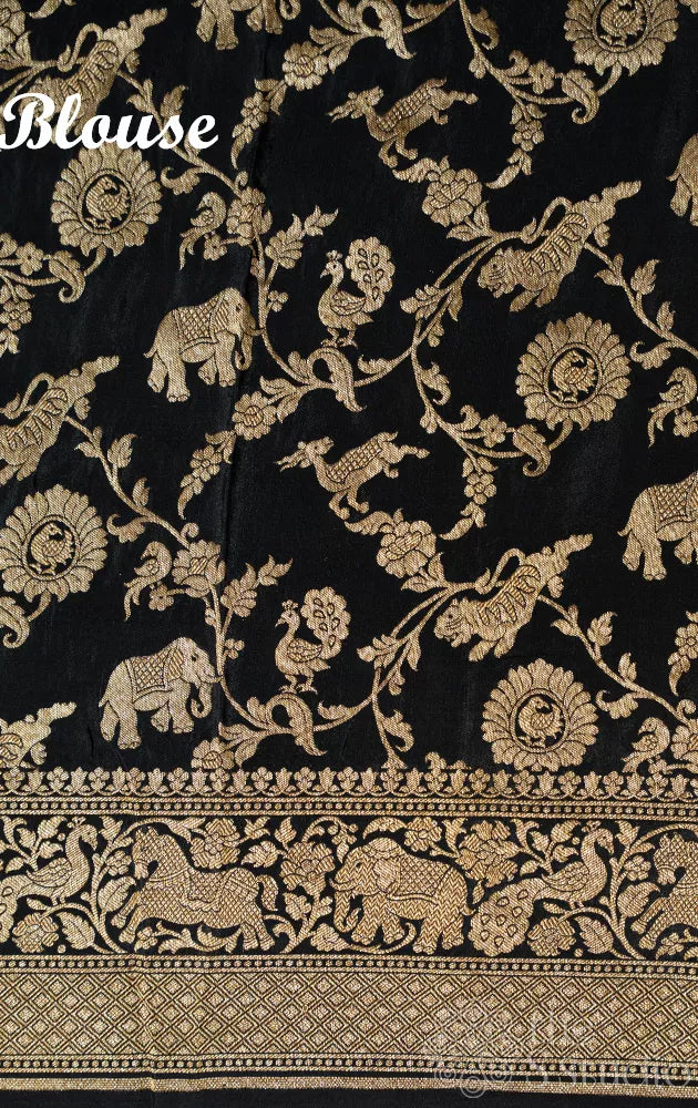 Black crepe banarasi silk saree with antique zari buttas and border