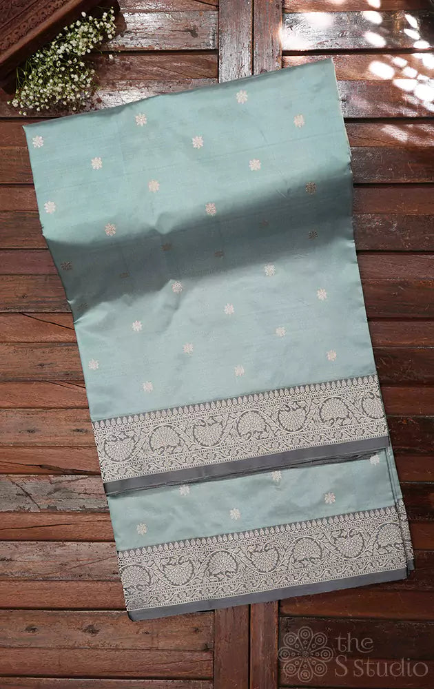 Powder blue handwoven lightweight banarasi katan silk saree with grey contrast border