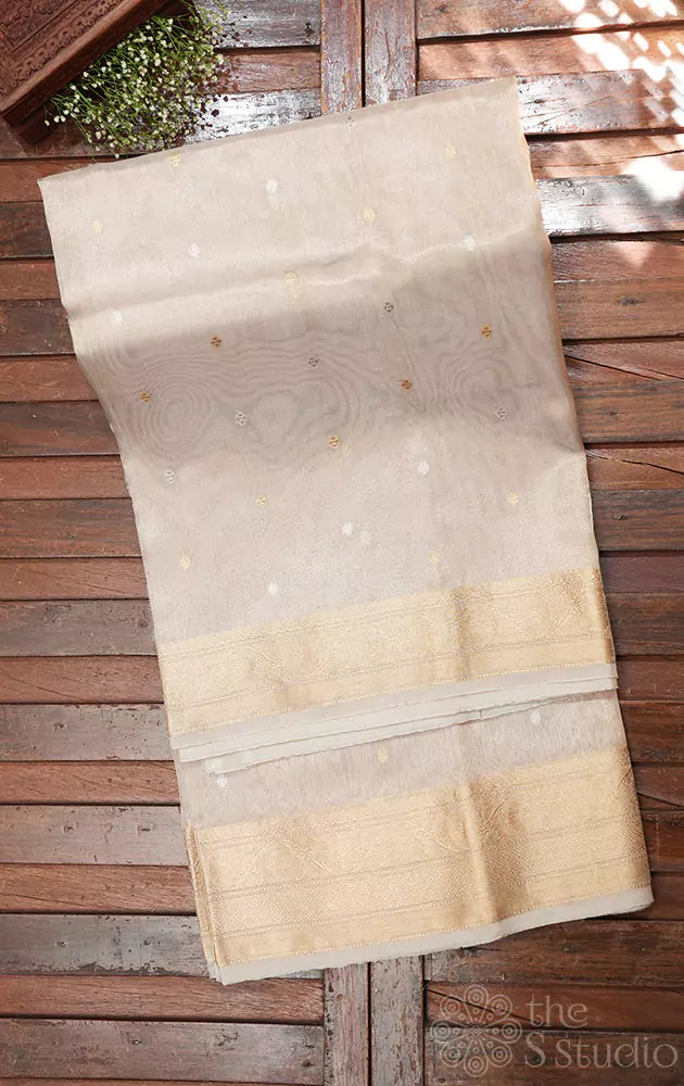 Beige and gold banarasi tissue silk saree with small zari buttas
