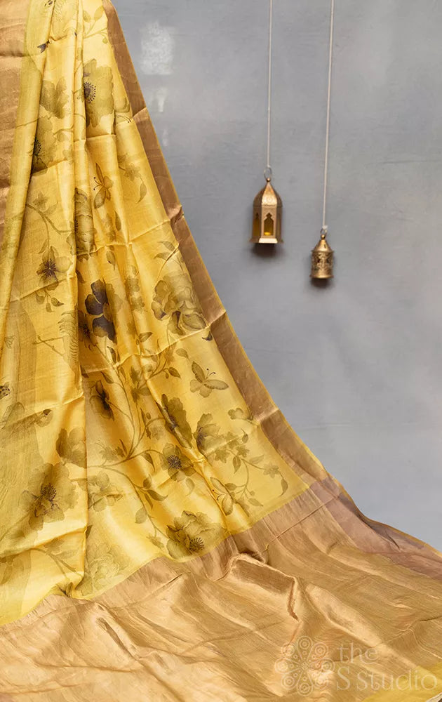 Yellow printed tussar banarasi silk saree with zari border