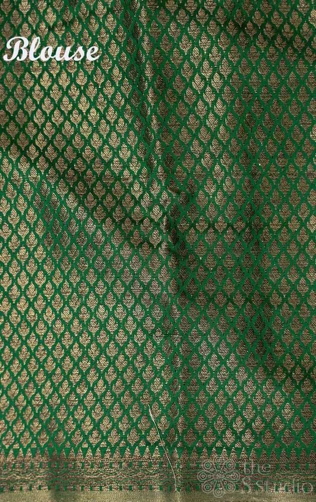 Green banarasi chiniya silk saree with small antique zari buttas