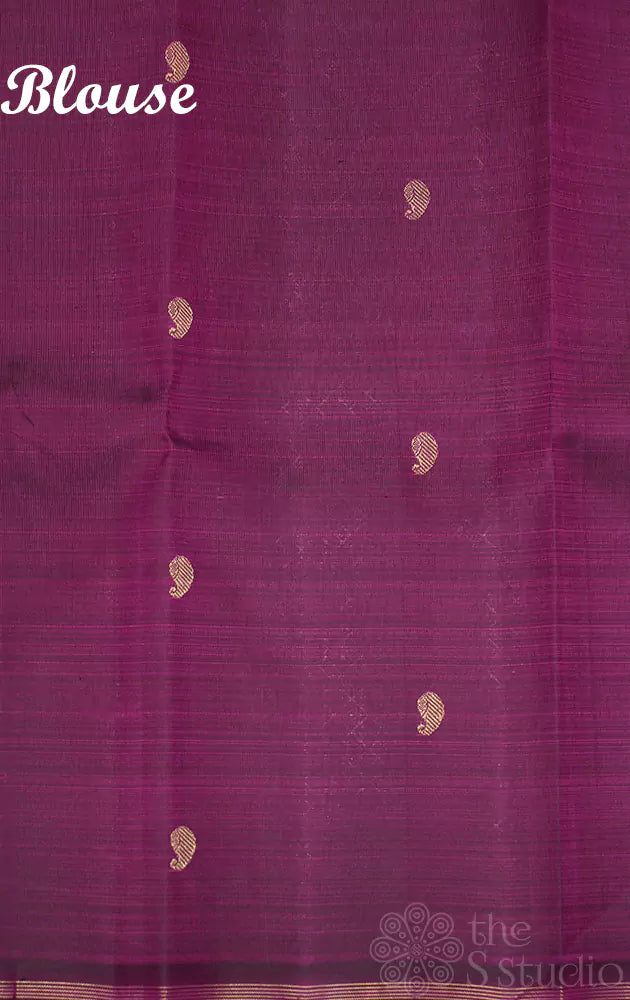 Peachish orange kanchi silk saree with double pallu