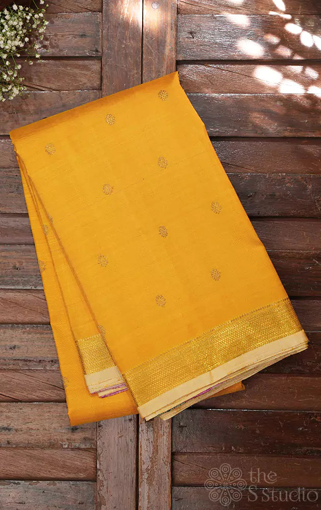 Yellow kanchi silk saree with paalum pazhamum checks pallu and blouse