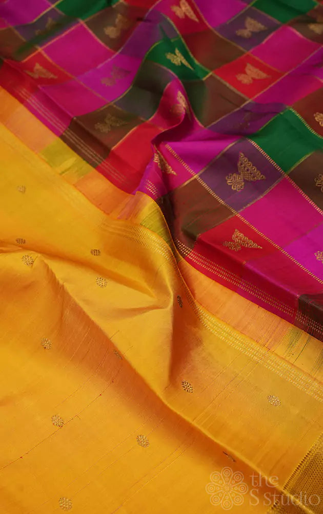 Yellow kanchi silk saree with paalum pazhamum checks pallu and blouse
